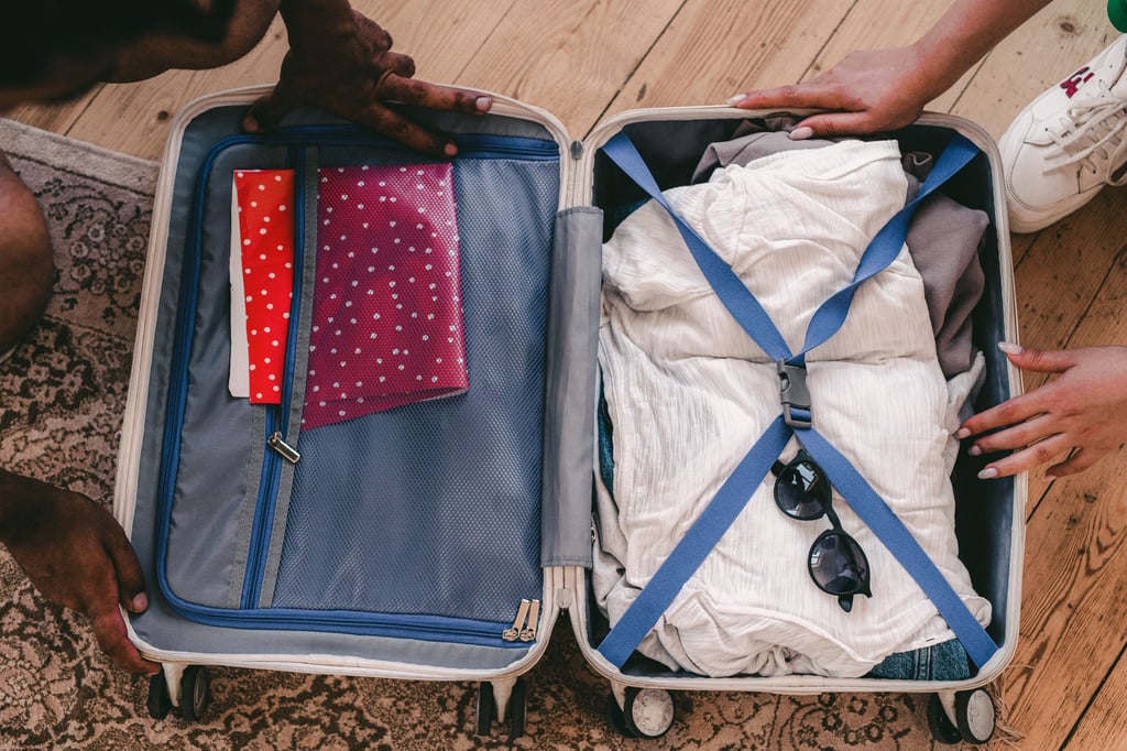 packed suitcase open clothes