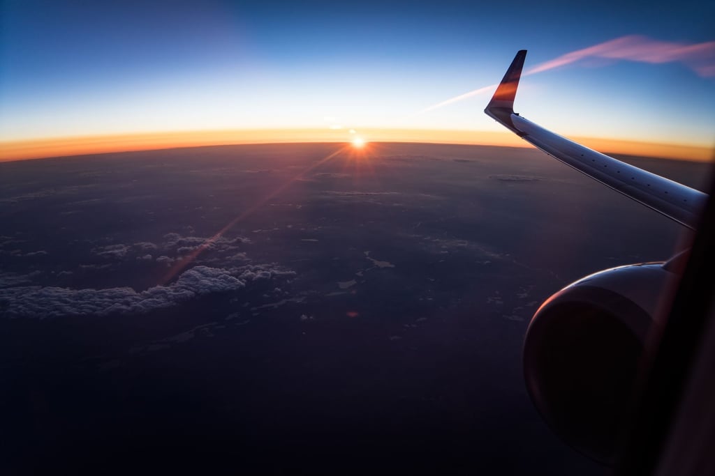 airplane wing sunrise clouds - Rajahmundry Airport Guide: Flights, Routes and Transfers